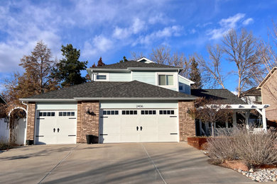 Mid-sized elegant attached garage photo in Denver