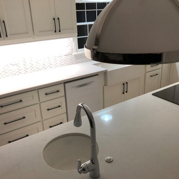 Chrome Pendant Lighting, Island Sink, Downdraft cooktop