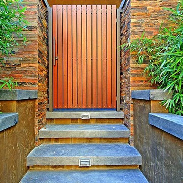 9342 Sierra Mar Holllywood Hills luxury home warm, modern textured entry gate &