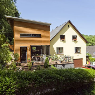 Anbau Singer - Wohnhausanbau mit Pultdach und Holzfassade