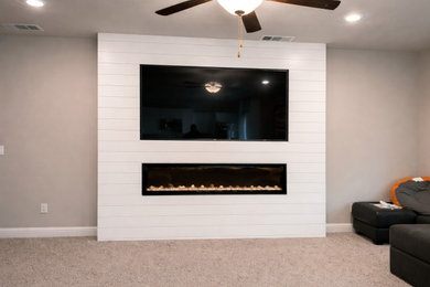 Example of a country family room design in Other