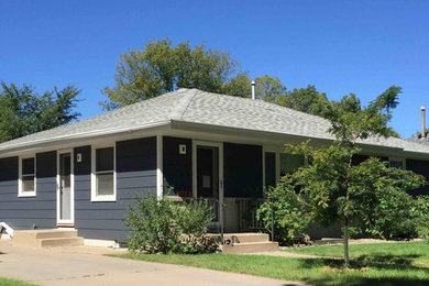 Mid-sized trendy gray one-story wood house exterior photo in Minneapolis with a hip roof and a shingle roof