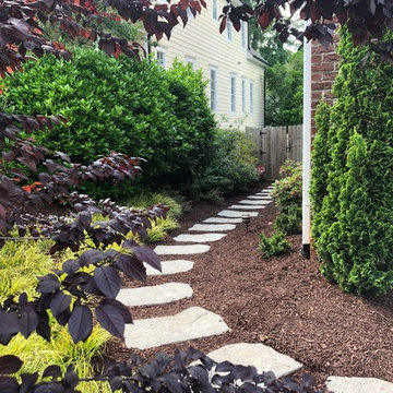 Mulching,pruning,sod, river rock, stepping stone installs