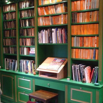 Gilded and painted library over several rooms in a converted 11th century barn