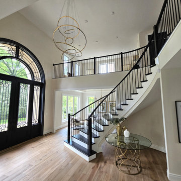 Project #130 | Curved Staircase with Wraparound Balcony