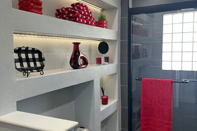 Example of a small minimalist master white tile and porcelain tile porcelain tile, black floor and single-sink bathroom design in Tampa with shaker cabinets, black cabinets, a bidet, white walls, marble countertops, white countertops, a niche and a freestanding vanity
