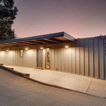 After - Street Elevation with Cantilevered Carport at Dusk
