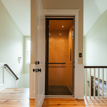 Traditional Island Home Elevator and Stair