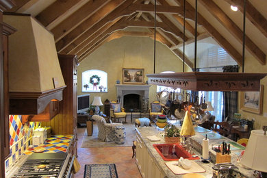 Example of a large classic ceramic tile kitchen design in St Louis with beaded inset cabinets, light wood cabinets, granite countertops, multicolored backsplash, ceramic backsplash, stainless steel appliances, an island and a single-bowl sink