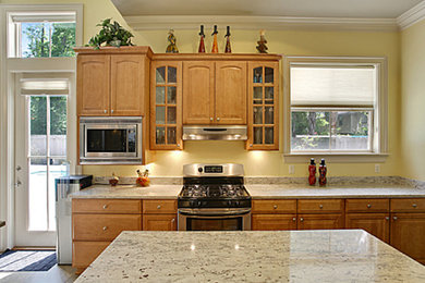 Example of a transitional kitchen design in New Orleans