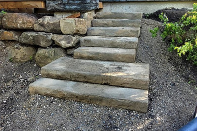 Example of a mountain style home design design in Calgary