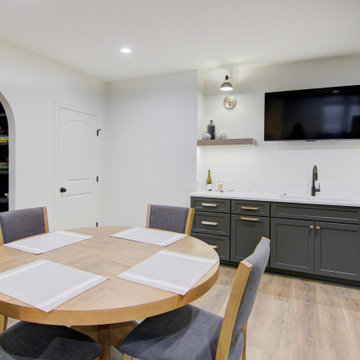 Warm & Inviting Basement Retreat with Kitchenette and Reading Nook