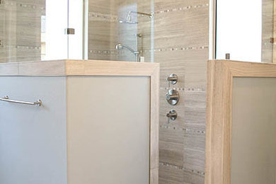 Inspiration for a large modern master gray tile and stone tile bathroom remodel in Austin with recessed-panel cabinets, white cabinets, a vessel sink and granite countertops