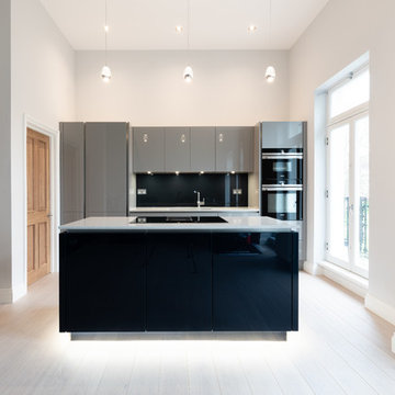 Grey and blue kitchen layout with island