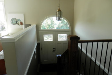 Transitional home design photo in Vancouver