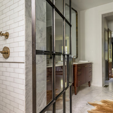 Gorgeous Master Bath with Custom Made Pivoting Brass Shower Door