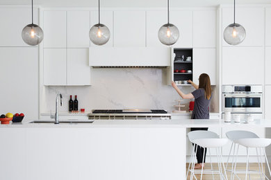 Example of a minimalist kitchen design in Toronto