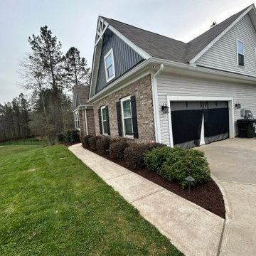 Custom Turf Landscape Area with Stone Border