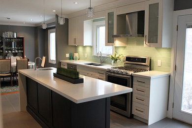 Example of a transitional kitchen design in Toronto
