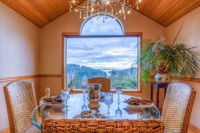 Example of a transitional dining room design in Seattle