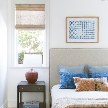 Bedroom with Sculptural Lighting and Layered Color Accents