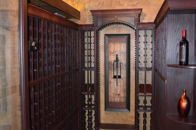 Mid-sized elegant ceramic tile wine cellar photo in Charlotte