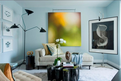 Inspiration for a mid-sized eclectic formal and open concept carpeted living room remodel in New York with blue walls, no fireplace and no tv