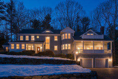 Inspiration for a huge contemporary gray three-story wood exterior home remodel in Portland Maine