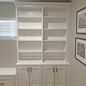 Custom Built-In Cabinets and Window Seat shown in Bright White on Maple