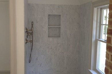Inspiration for a transitional 3/4 bathroom in New York with an alcove shower, gray tile, marble and an open shower.