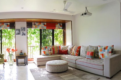 Trendy living room photo in Mumbai
