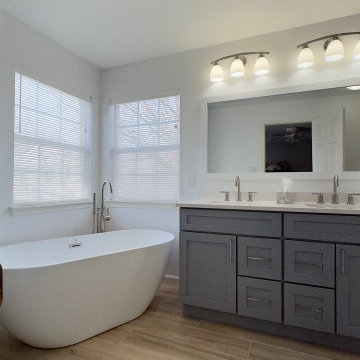 Spacious Bathroom with Dual Vanity and Freestanding Tub