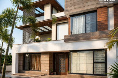 Example of a trendy exterior home design in Other