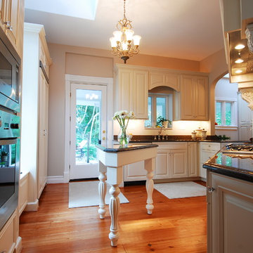 White Maple Traditional Kitchen with Black Granite in Germantown, MD