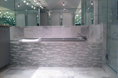 Contemporary bathroom in Tampa with gray tile.