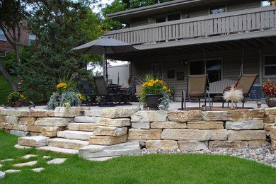 Example of a mountain style patio design in Other
