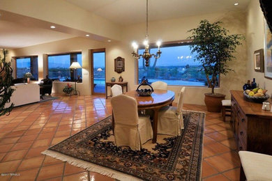 Inspiration for a large transitional brown floor great room remodel in Miami with beige walls
