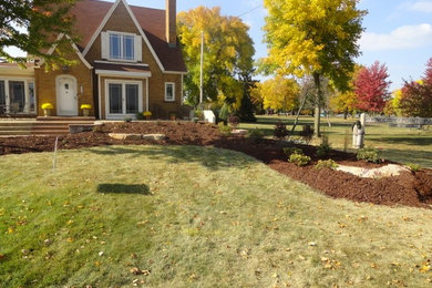 Inspiration for a large full sun stone formal garden in Other.