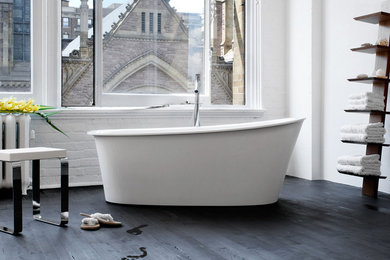 Large minimalist master dark wood floor freestanding bathtub photo in Other with open cabinets and dark wood cabinets