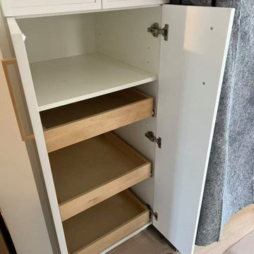 White Slim Shaker Kitchen with Waterfall Peninsula