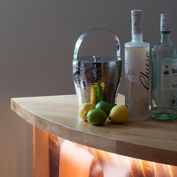 Glamorous copper cocktail bar with concealed LED lighting