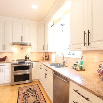 Arched Valance and Open Shelf Above Sink Offers Display Space and Bridges the Tw