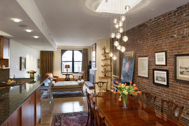 Large elegant light wood floor and beige floor great room photo in New York with yellow walls and a standard fireplace