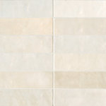 Bedrosians Tile and Stone - Cloe 2.5"x8" Artisan Ceramic Subway Tile, Creme - The Cloe Collection is glazed ceramic wall tile characterized by its brilliant colors, smooth gloss finish and interesting variations in hues and tones. Its eight colors: White, Creme, Baby Blue, Grey, Pink, Green, Blue and Black, can be used in a wide range of combinations. For a pop of pattern, we've included a 2.5"x8" black and white Loire deco. Trim out your projects with the 1/2"x8 Jolly Miter Edge Trim in a gloss finish.