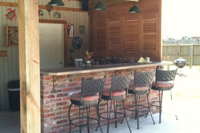 Inspiration for a tropical patio remodel in Minneapolis