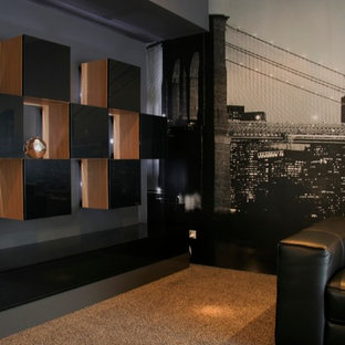 Mid-sized urban enclosed carpeted and gray floor home theater photo in Perth with gray walls and a media wall