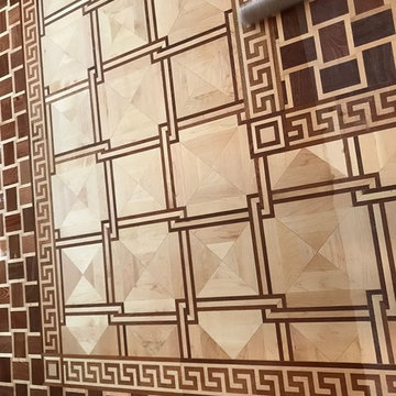 Decorative border frames the flooring much like a picture frame