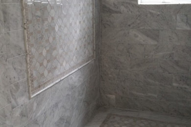 Mid-sized stone tile bathroom photo in New York