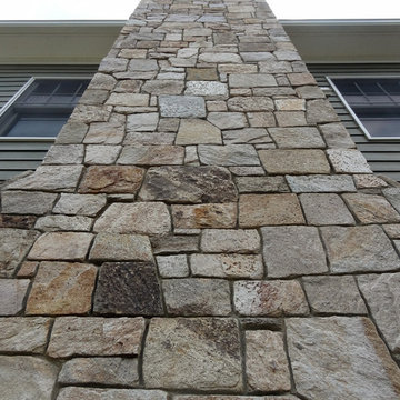 Combining Colonial Tan Natural Stone with Olive Green Siding
