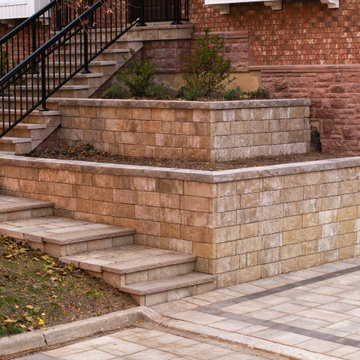 Custom Front Entrance Stonework & Retaining Wall Landscape Design